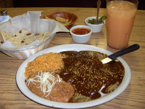Chicken Mole and Melón drink Chicken Mole and Melón drink