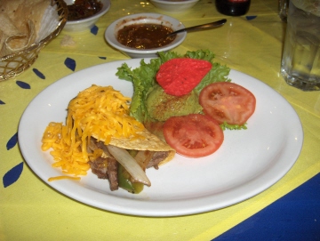 Taco with yellow cheese