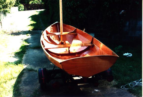 The completed boat with mast in the step.