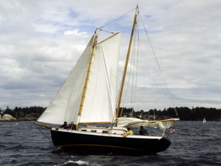 divided rig vessel  - a schooner rig -  
in less tippy reefed state.
reefing is preferable to more weight
on boats with hulls of fiberglass
and speed is often increased after
reefing because the vessel can 
maintain her optimum heel.