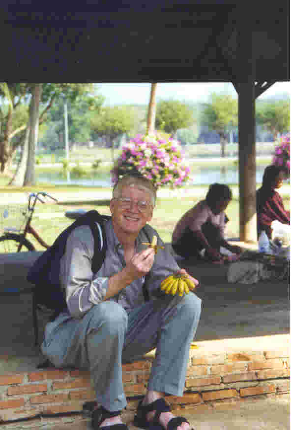 Eating "baby" bananas in Sukothai in central Thailand