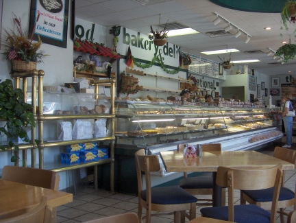 There is a large selection of cookies, cake, and bread