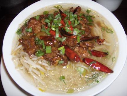 Spicy pickle noodle bowl with beef