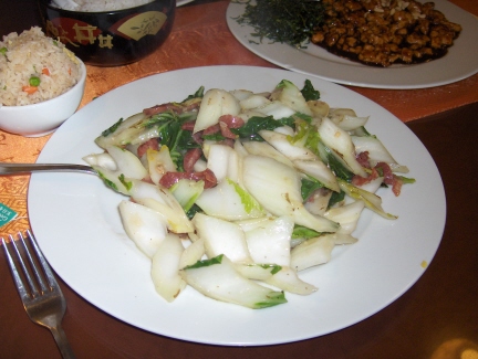 Steamed sausage and bok choy, with Shanghai tofu barely visible in the background