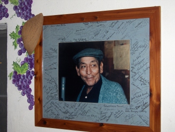 A portrait of Chope hangs in the dining room