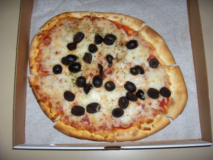 Pizza with cheese and black olives
