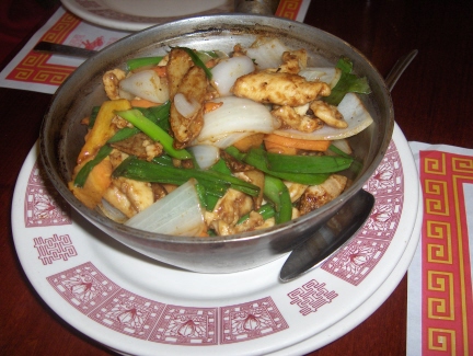 Hot pot with chicken and green onion